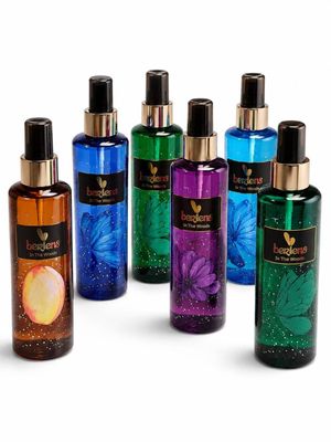 an image of a group of different colored bottles of perfume