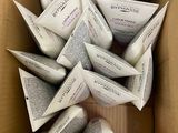 a cardboard box filled with lots of different types of skin care products