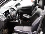 the interior of a car with a steering wheel and a dashboard