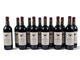 six bottles of wine lined up in a row on a white surface