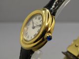 une image montrant un gros plan d'une montre-bracelet sur laquelle figure un cadran
