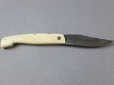 a knife that is sitting on a table