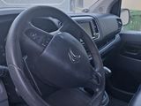 a black dashboard and steering wheel of a truck