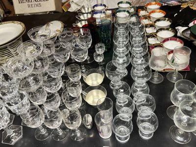 a lot of empty wine glasses on the table
