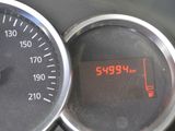 a close up of a speedometer on a car ' s dashboard