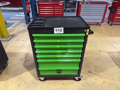an image of a green and black tool cart in a garage
