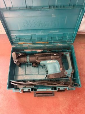 a blue tool box with a hammer and a hammer in it