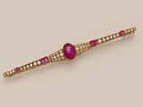 a ruby and diamond bar broochle