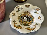 a plate with a picture of a man and a woman on it