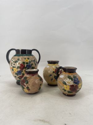 three vases sitting next to each other on a table