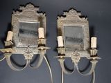 pair of antique brass wall sconces with mirrors and candles