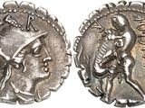 a silver coin with an image of a man and a woman on it