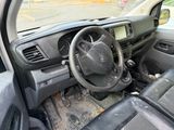 a steering wheel and dashboard of a car that has been vandalized