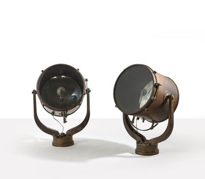 pair of antique spotlight lamps on a white background