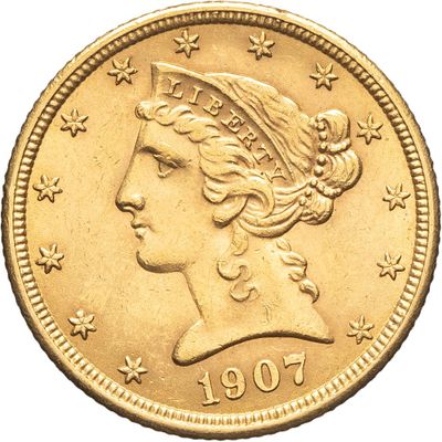 gros plan d'une pièce de monnaie sur laquelle figure une tête de femme