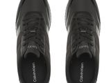 a pair of black sneakers on a white background
