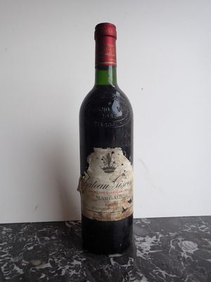 a bottle of wine that is sitting on a table