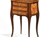 an image of a wooden table with drawers on it