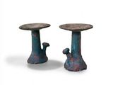 two small tables that are sitting next to each other
