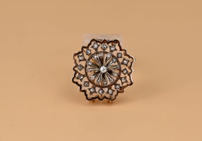 Broche en or rose 14K 585/1000e figurant une étoile à bords …