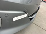 a sticker on the bumper of a car that says,