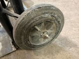 a close up of a wheel on the ground