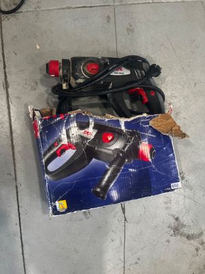 a box with a remote control on the floor