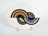 a white plate with a colorful design on it
