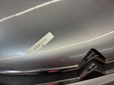 a close up of a car with a sticker on it