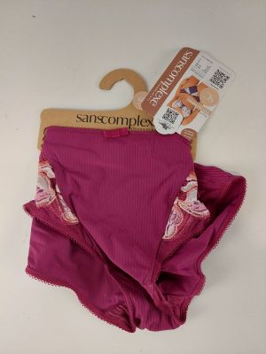 purple panties with pink flowers on them on a white surface