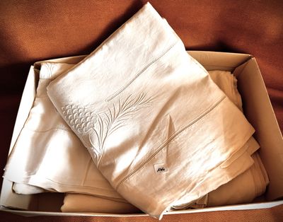 a box that has a bunch of folded towels in it