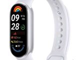 a close up of a smart watch with a white band