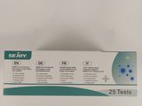 a white box with a blue and green label on it