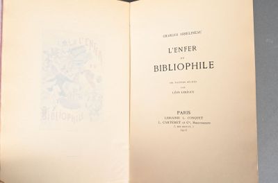 someone is holding a book open to a page with a picture on it