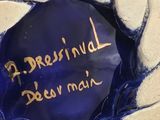 a blue vase with writing on it that says fresnival beer main
