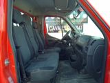 an image of a red van with black seats