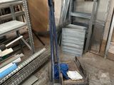 a cart that has a broom and a broom on it in a room