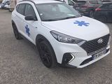 a white car with a blue star on the front