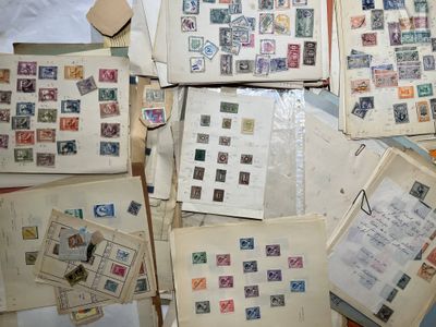 a lot of old stamps on the table together