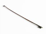 a long wooden stick with a metal handle on a white surface