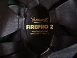 a close up of a black and gold logo on a computer fan