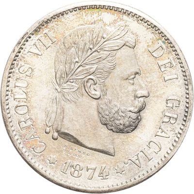 an old coin with a man ' s head and a feather on it