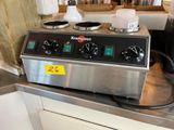 an image of a kitchen with a stove and two burners on it