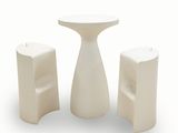a white table and two stools sitting next to each other