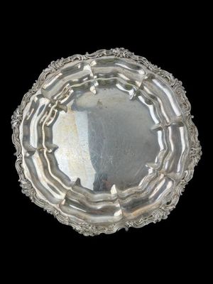 an image of a silver plate on a black background