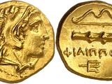 a gold coin with the head of a lion on it