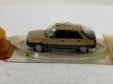 a toy car that is sitting on top of a table