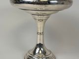 silverplated footed bowl with raised rim and raised feet