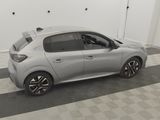a picture of a silver car parked in a garage