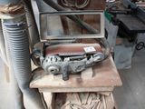 a picture of a workbench with a computer on it